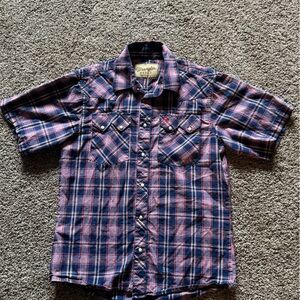 Gently used short sleeve wrangler, western shirt with yolks and pearl snaps